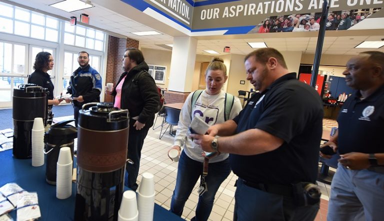 Officer with students