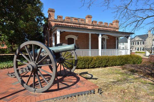old building with cannon