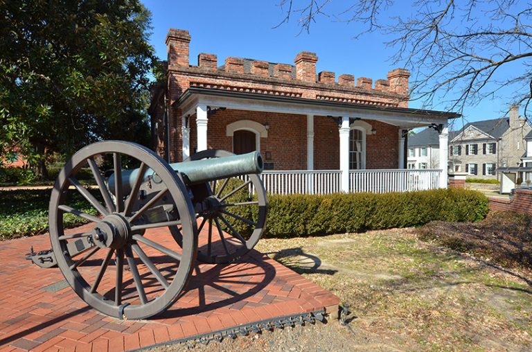 old building with cannon