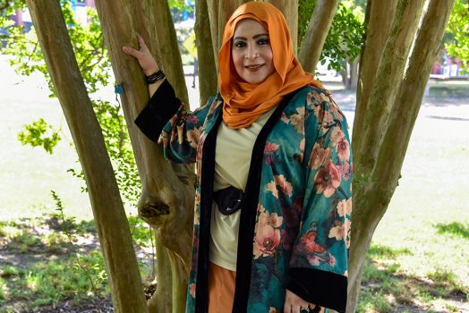 Woman in hijab under tree