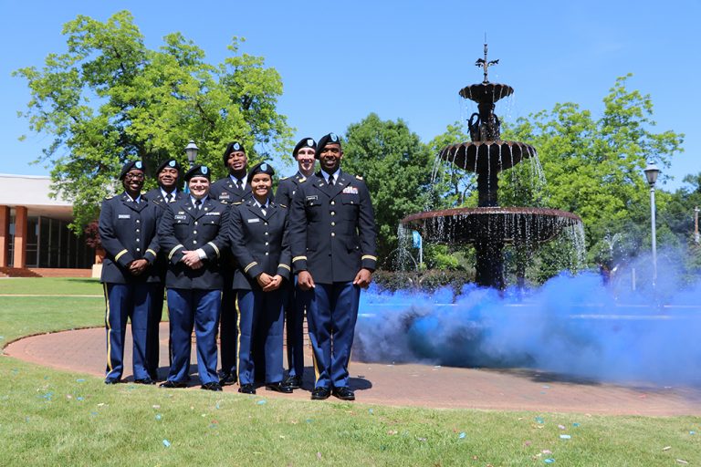 Men and women posing