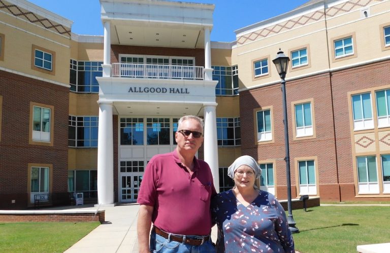 Two professors standing