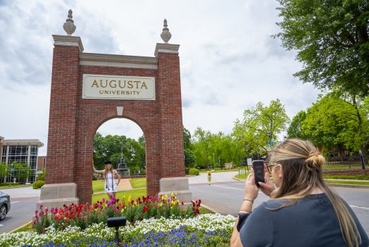 Graduate getting photo taken