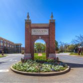 brick archway at entrance of Augusta University