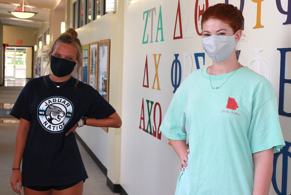 women with masks