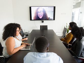 People meeting virtually and in person