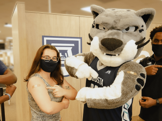 People with Jaguar mascot