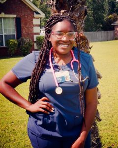 Woman in scrubs