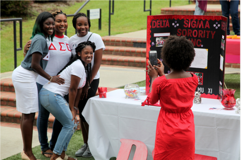 women posing for photo