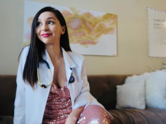 woman smiling in white coat