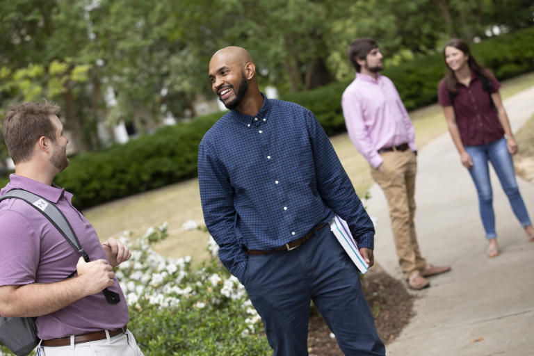 students standing outside on Summerville Campus