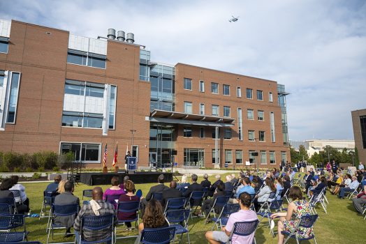 people sitting in front of a building