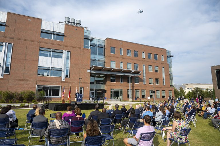 people sitting in front of a building