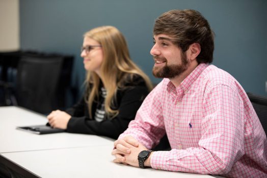 two students sitting at a desk