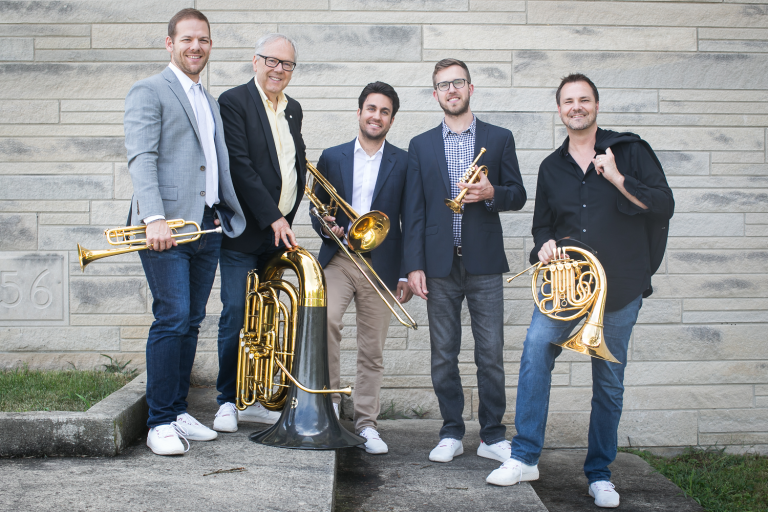 5 men holding instruments