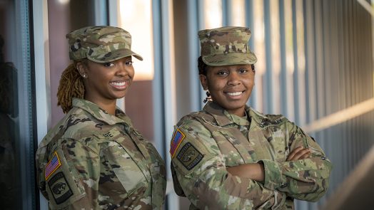 Two women smiling