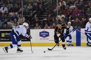 men playing hockey