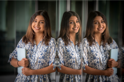 woman standing near building