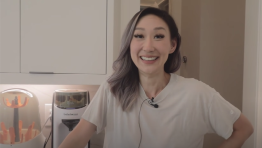 woman smiling in kitchen