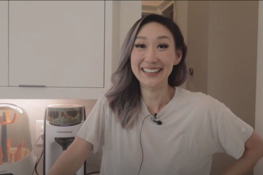 woman smiling in kitchen