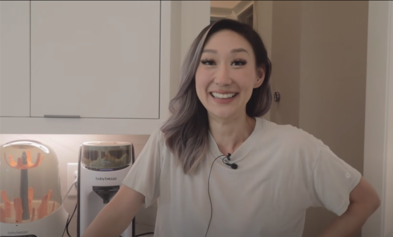 woman smiling in kitchen