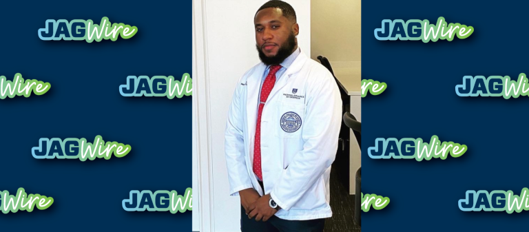 man in a white coat