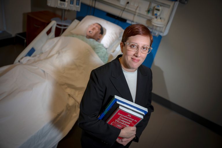 Doctor in room with hospital bed
