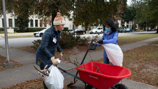 two people with a wheelbarrow