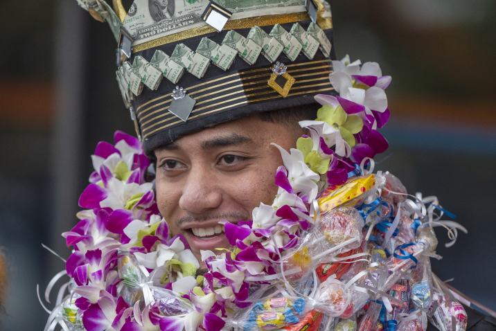 graduate adorned with crown and other decor