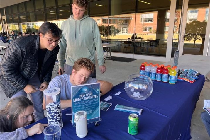 students at a tabling event