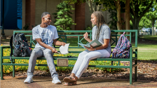 students talking outside