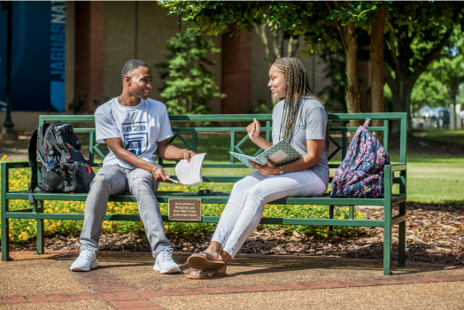 students talking outside