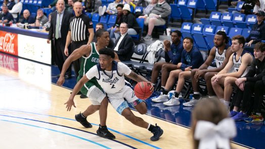 Men playing basketball