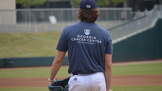 Baseball Player Wearing Georgia Cancer Center Shirt