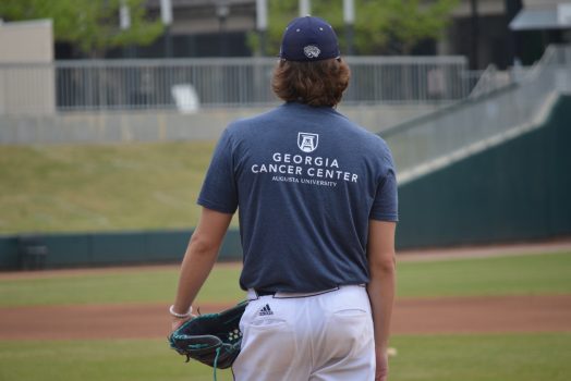 Baseball Player Wearing Georgia Cancer Center Shirt