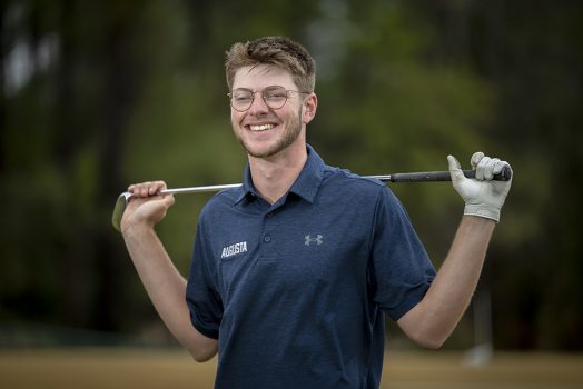 Man holding golf club