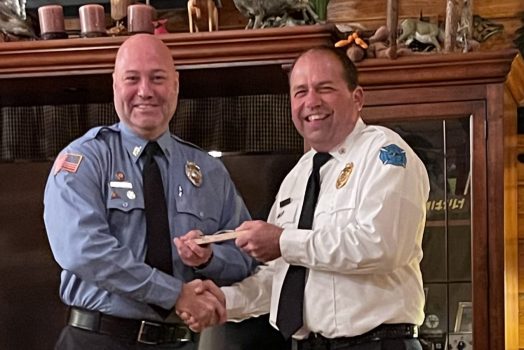 Man being given an awardd