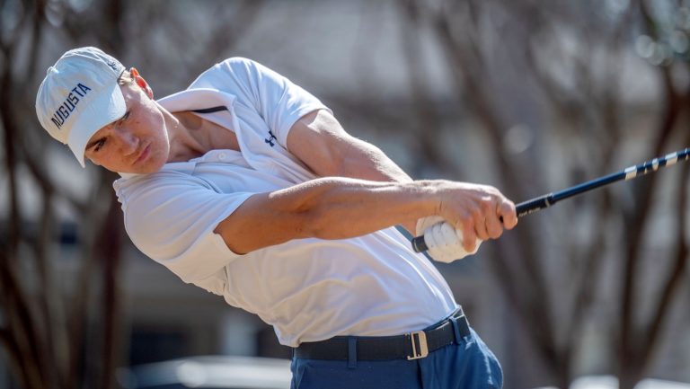 man golfing