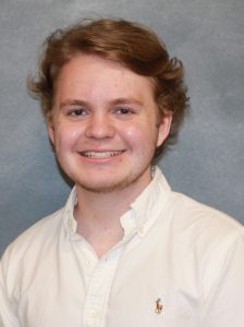 male student in white shirt