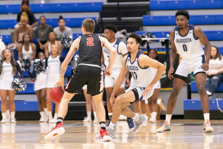 Men playing basketball