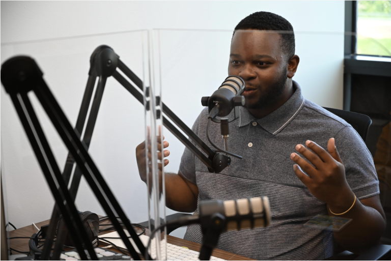 man talking into microphone