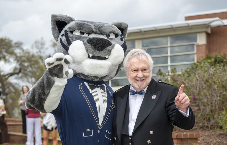 Jaguar mascot and President Brooks Keel