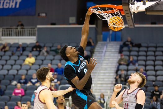 Men playing basketball