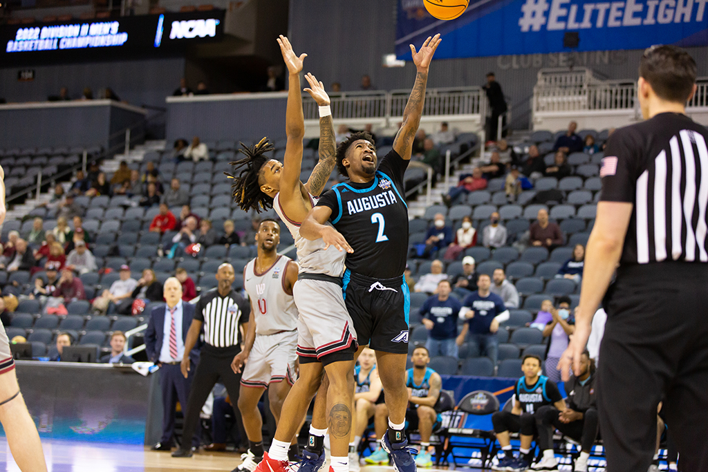 Men playing basketball