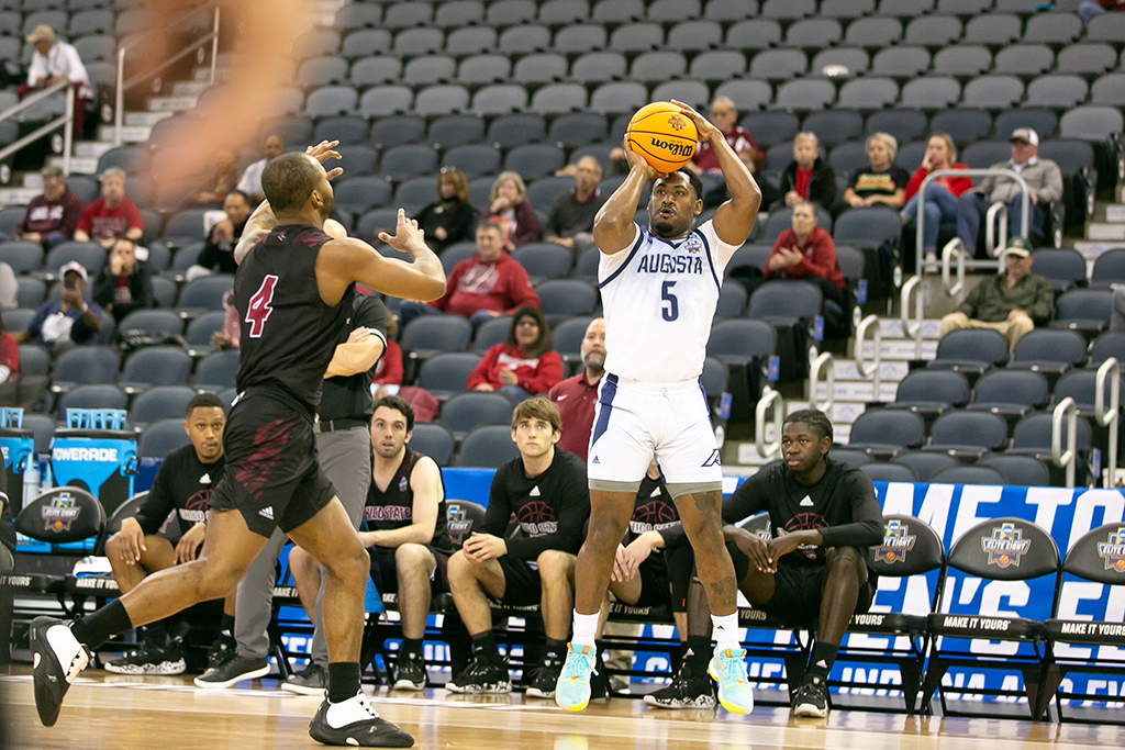 Men playing basketball