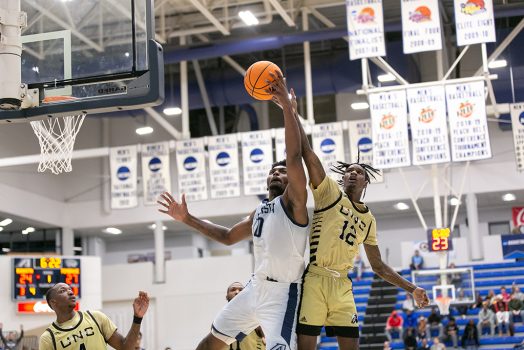 Men playing basketball