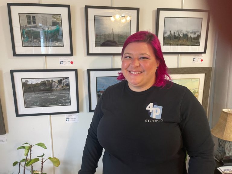 Woman standing in front of art