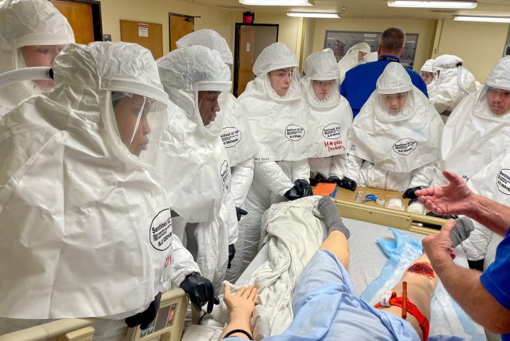 Students work in simulation in PPE