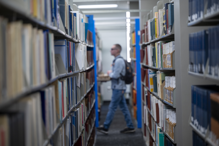man in library