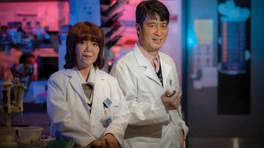 Man and woman in white lab coats